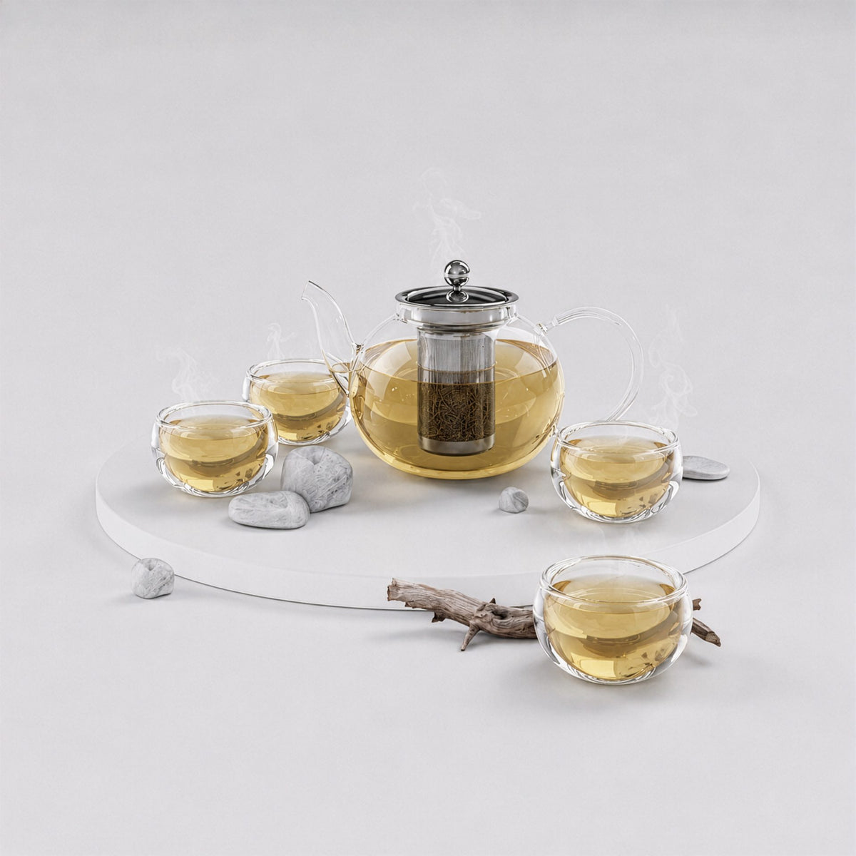 Tetera Flaska Tilia y cuatro tazas de doble pared con té preparado